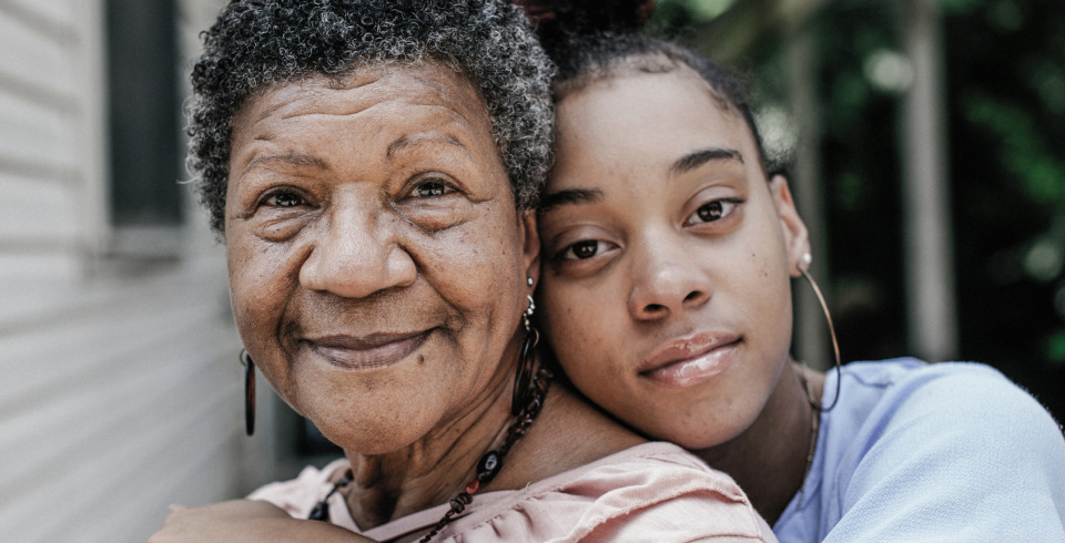 Intergenerational photo with grandmother and grandchild